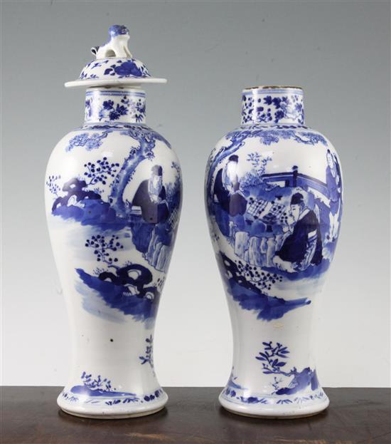 Two Chinese blue and white baluster vases and a cover, late 19th century, 28cm